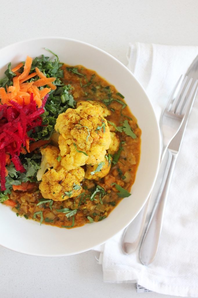 Whole Roasted Cauliflower in Lentil Curry